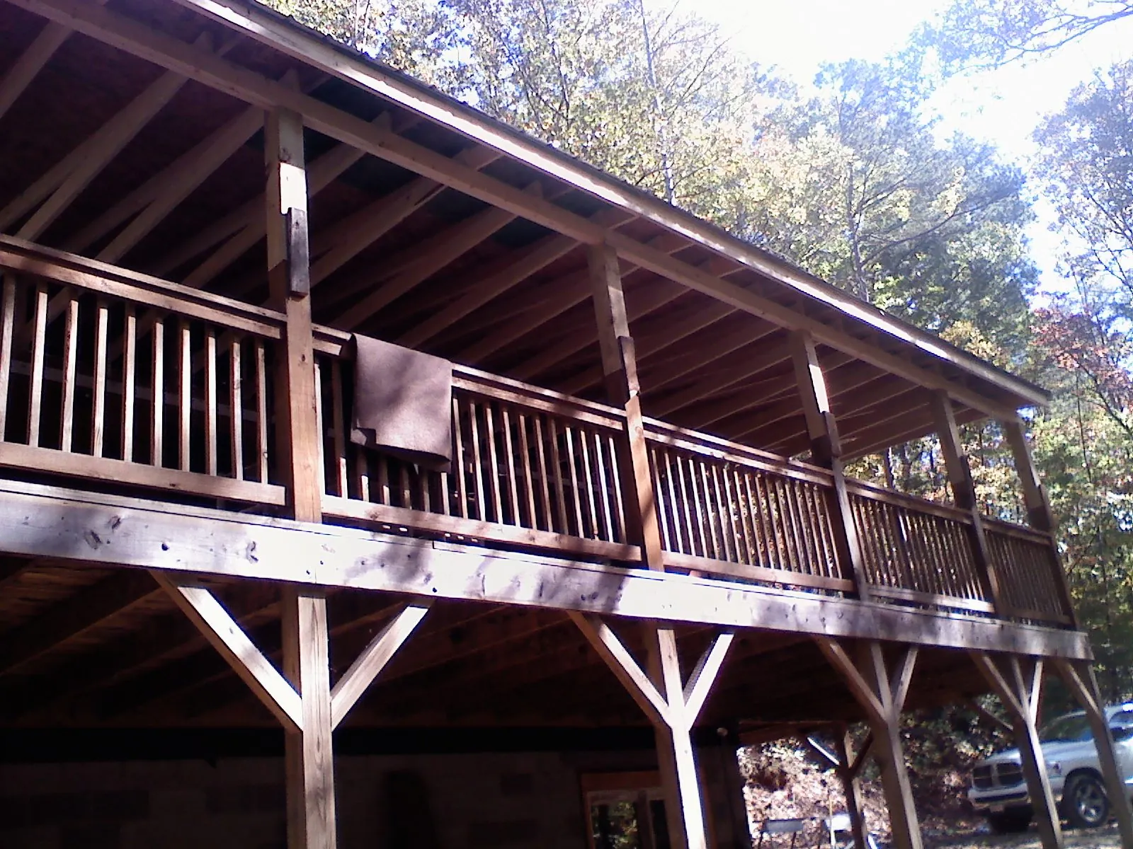Timber framing under a new elevated porch and deck — Roof Leak Repair in Upsala by Roofing Brothers